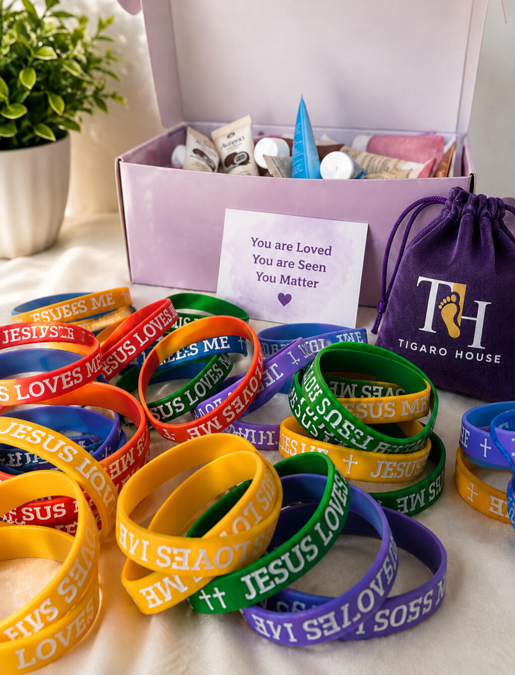 Tigaro House Christian encouragement gifts with colorful Jesus bracelets, uplifting messages, and small items created to brighten someone's day.